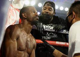 Crawford con coach McIntyre