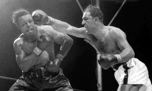 Marciano batte moore