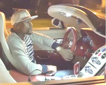 Mayweather in auto Bugatti